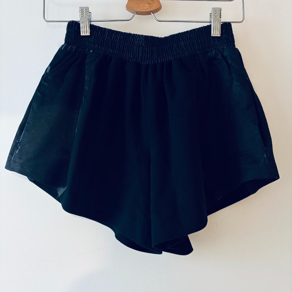 Black Maje shorts, model Dakar